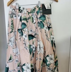 Floral pleated skirt. Size small brand new.